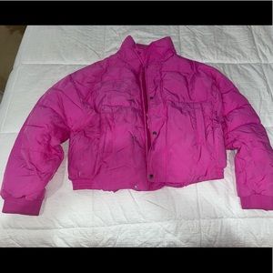 The brand is Free People, bright pink, puffy, and size small. Very comfortable.